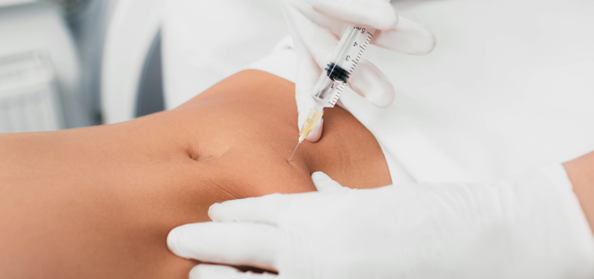 woman-getting-an-injection-in-her-tummy-close-up-2026-01-08-23-31-12-utc